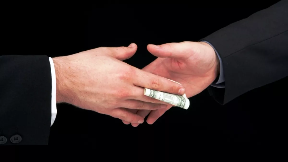 Apple manager accused of taking bribes