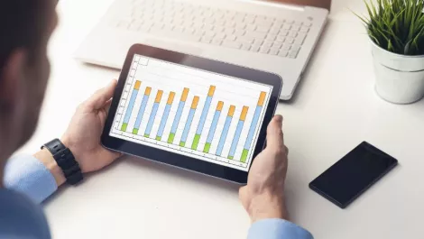 Man looking at stocks